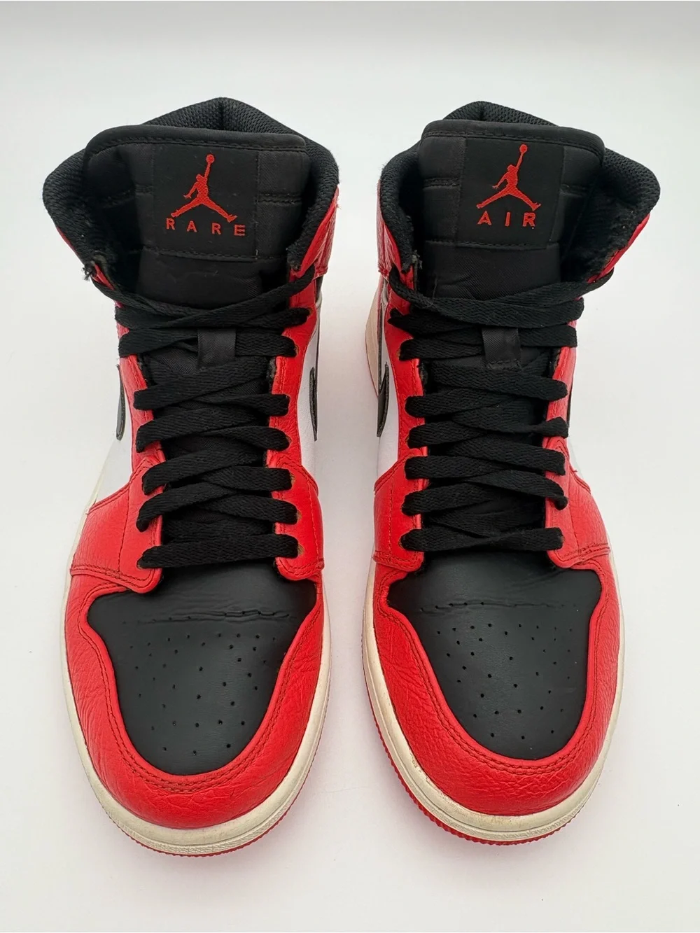 Jordan Men’s High-Top Sneakers in Red, Black, and White